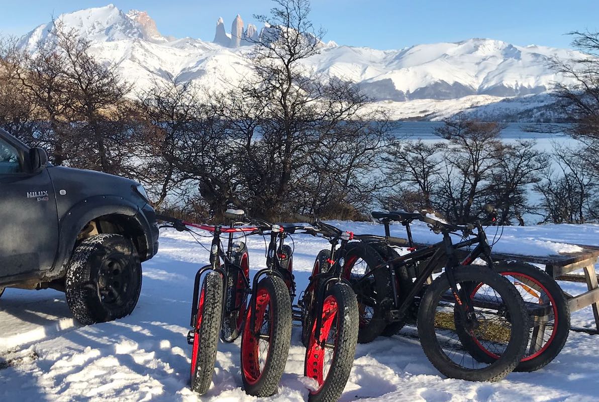 Mountain bikes in the snow at Lagina Azul in Torres del Paine