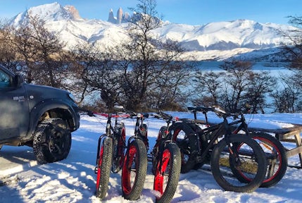 Mountain bikes in the snow at Lagina Azul in Torres del Paine