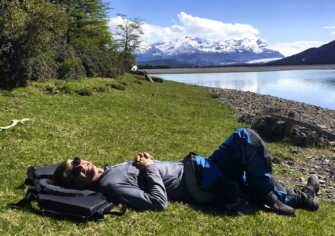 Taking a short siesta from kayaking, Patagonia, Chile