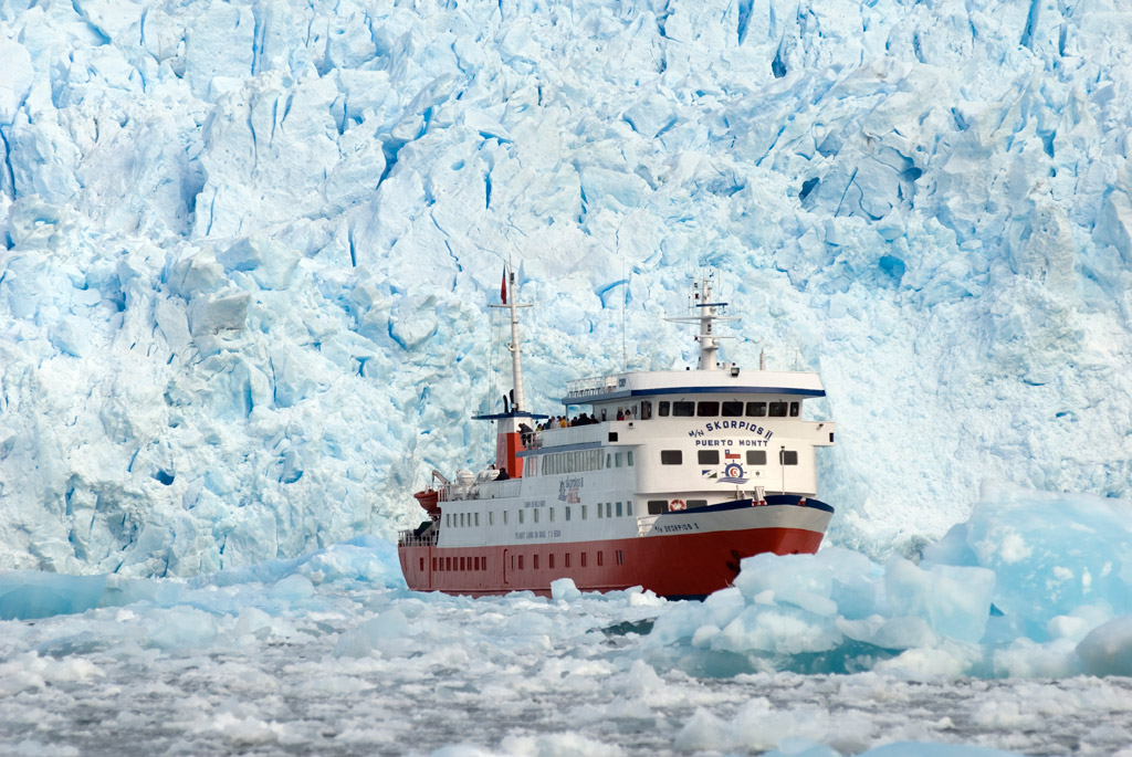 Skorpios II cruise ship in the northern Chilean Fjords, in front of San Rafael glacier