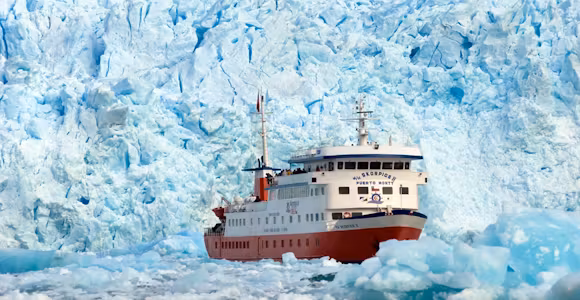 Skorpios II cruise ship in the northern Chilean Fjords, in front of San Rafael glacier