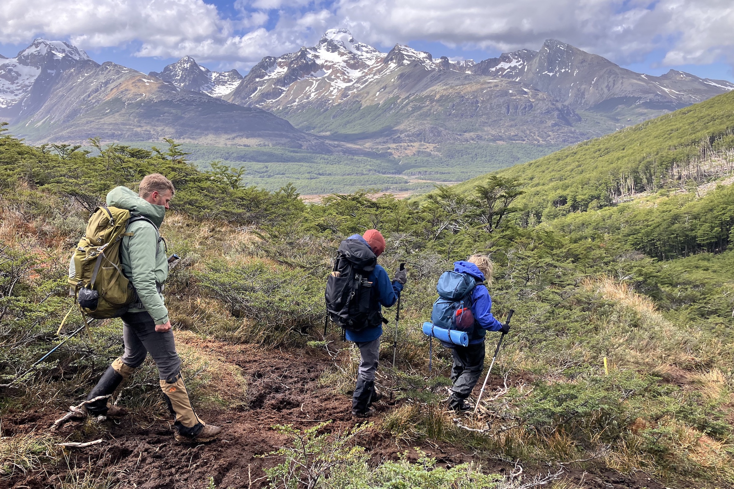 Hikers in the mountains on the Torres del Río Chico trek in Tierra del Fuego