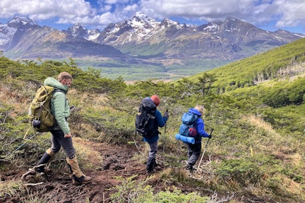 Hikers in the mountains on the Torres del Río Chico trek in Tierra del Fuego