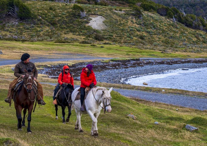 Horse riding on the coast near Puerto Williams on Navarino Island