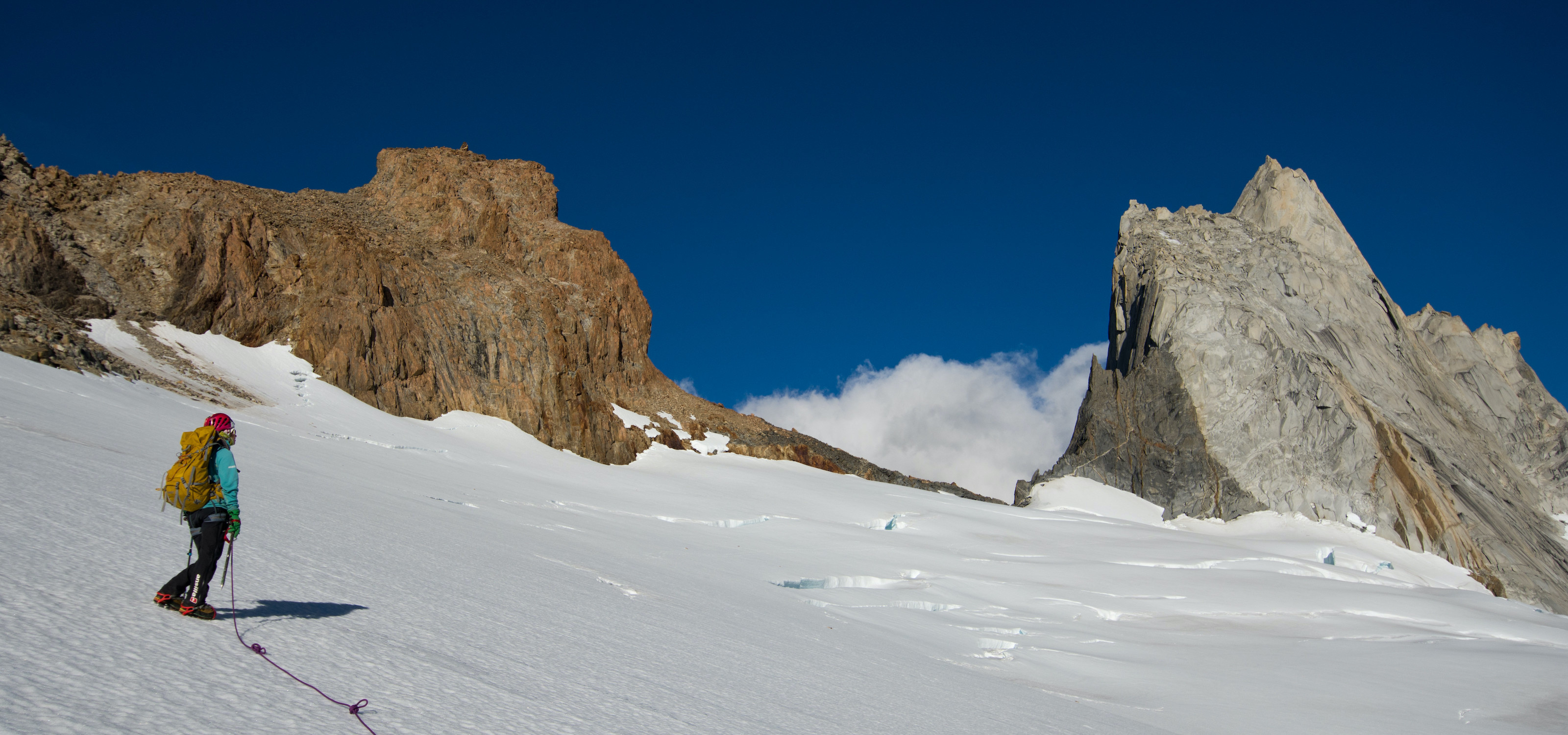 A climber on the snow in the approach to Cerro Mojon Rojo near El Chaltén