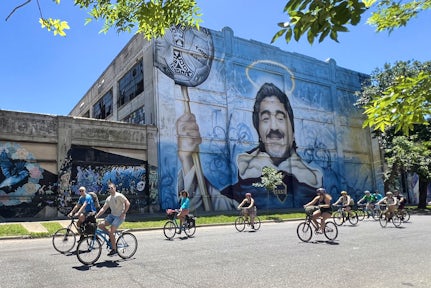 Bike tour of Buenos Aires with mural of Maradona