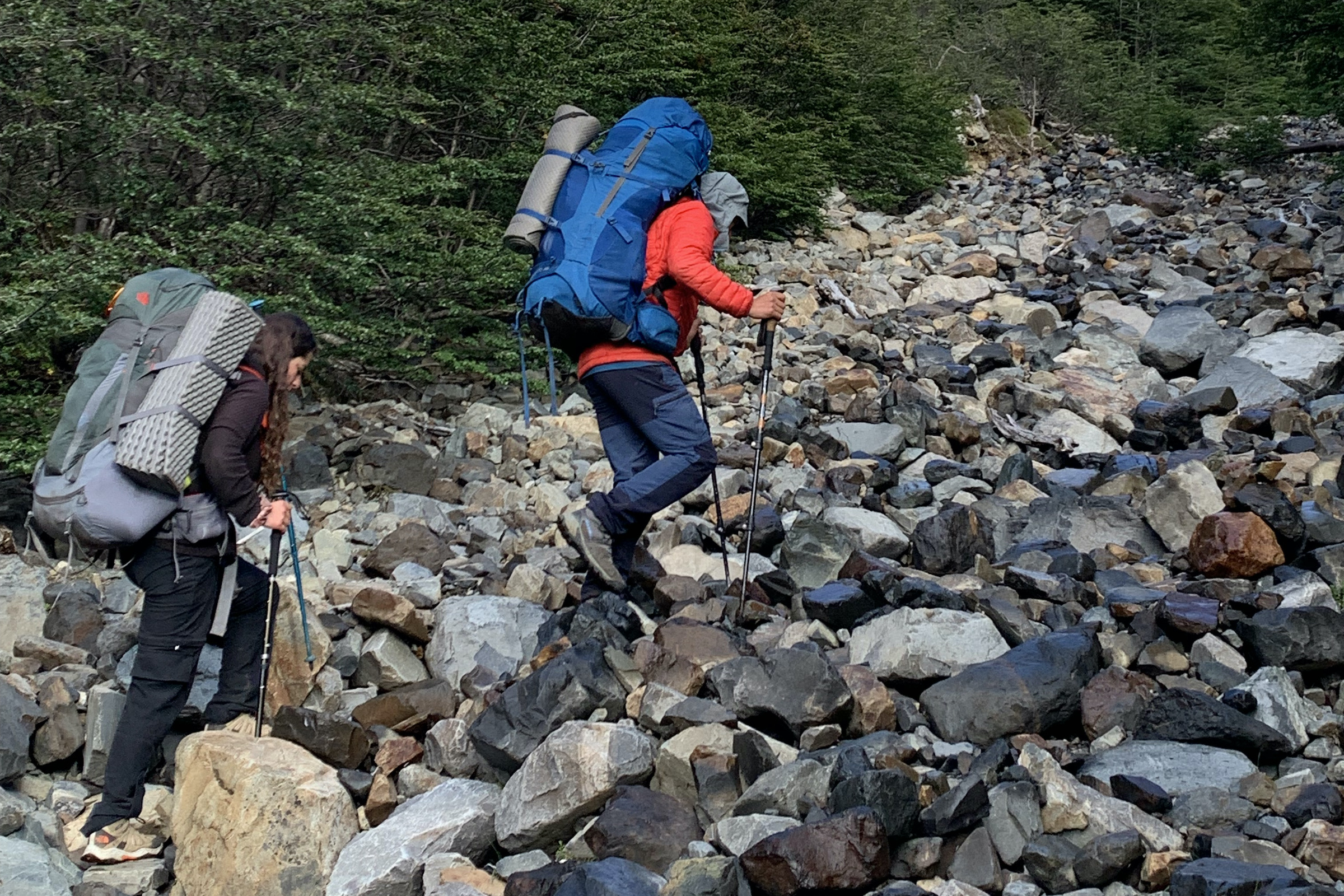 Hikers with rucksacks on the Cerro Castillo Horquertas trek