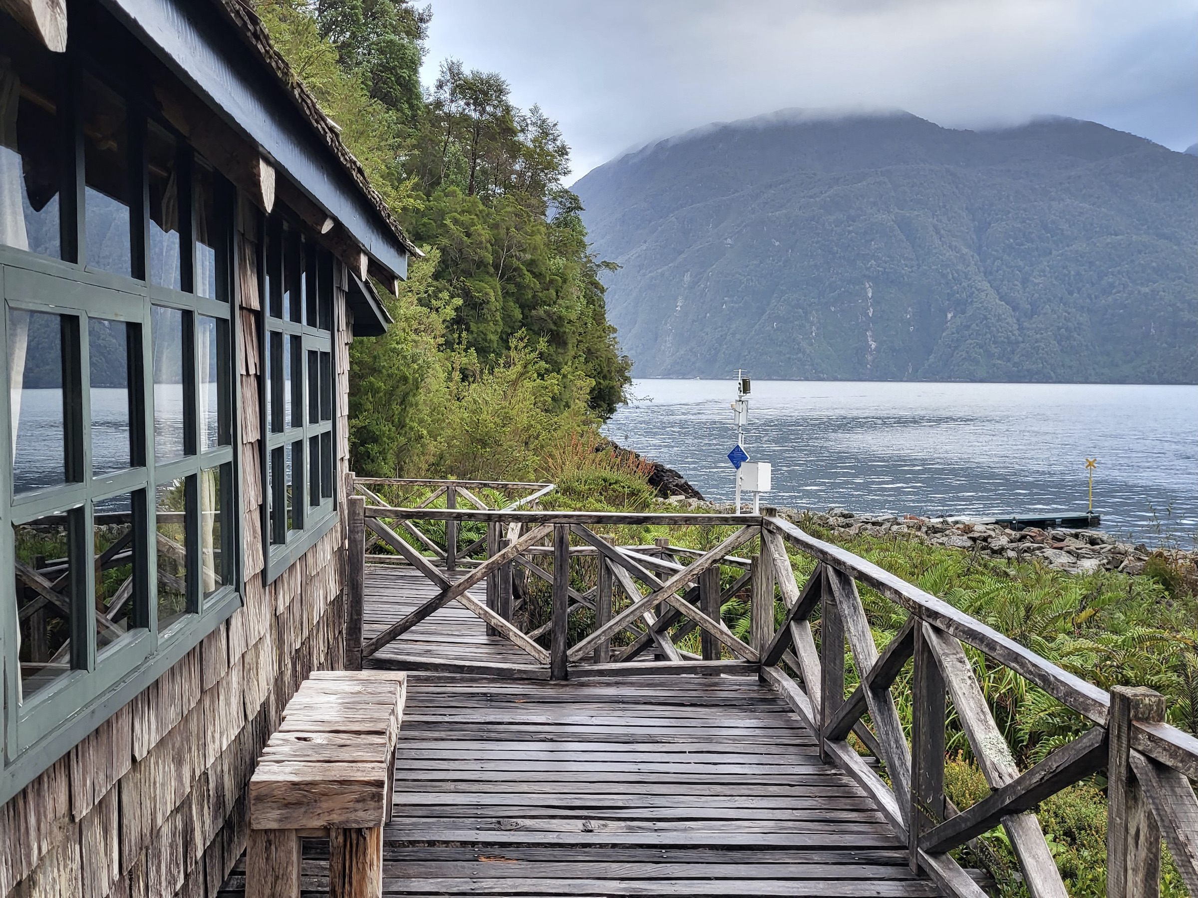View from the balcony of the wooden cabin-style Caleta Gonzalo Lodge near Pumalin Douglas Tompkins National Park in Chile