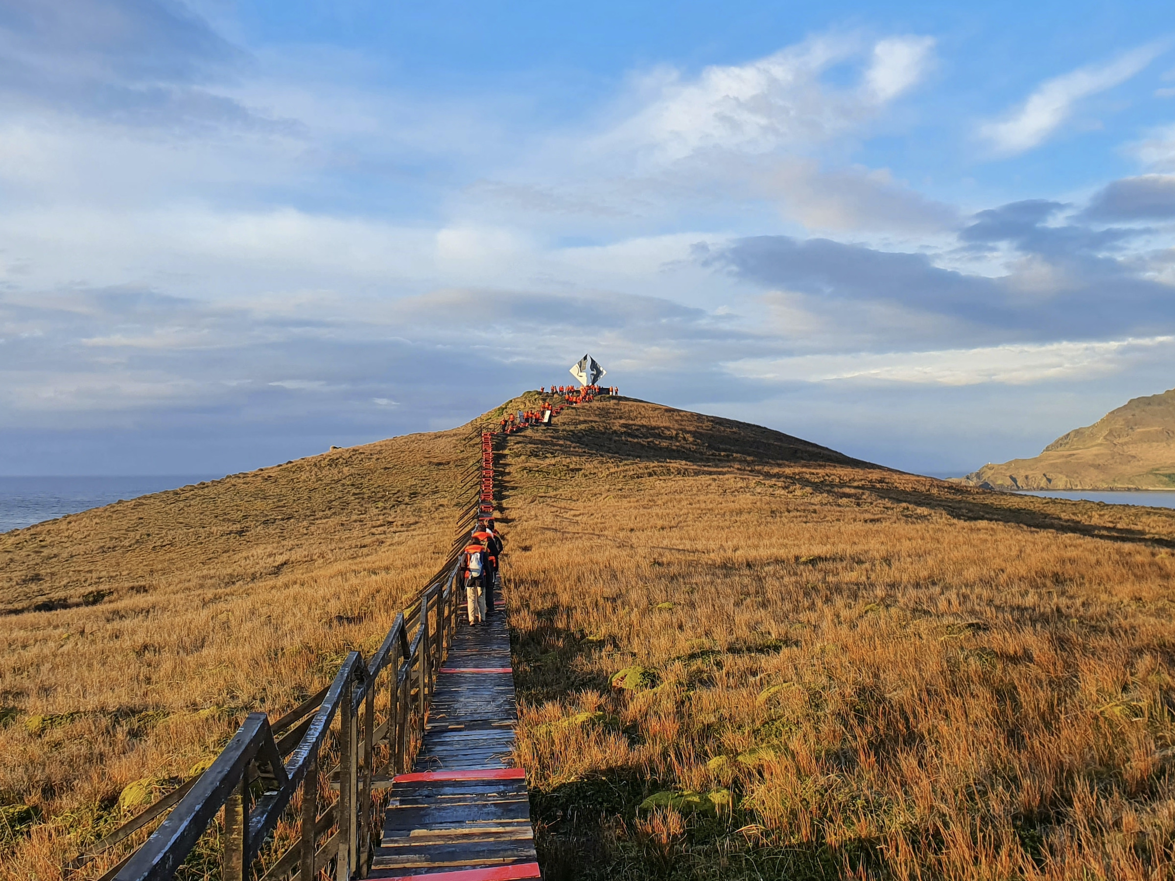 Wooden walkway leading to the Cape Horn monument in Tierre del Fuego
