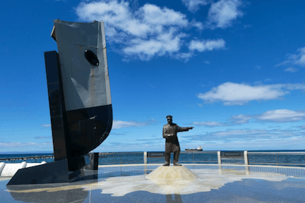 Punta Arenas waterfront with Yelcho monument