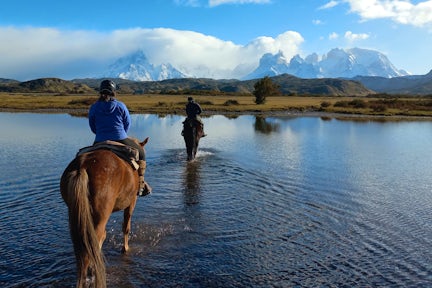 Horse riding in Torres del Paine towards Paine Massif
