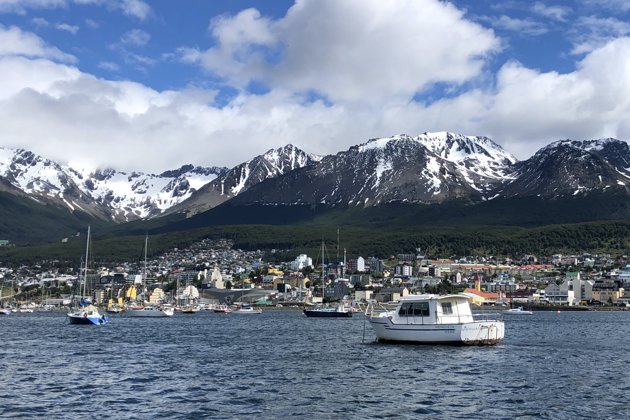 Ushuaia, Tierra del Fuego, and its port and mountains seen from the sea