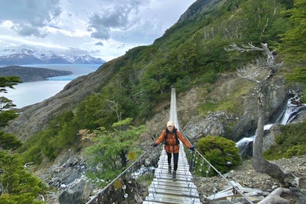 Hiker on aridge crossing near John Gardner Pass on the O Circuit