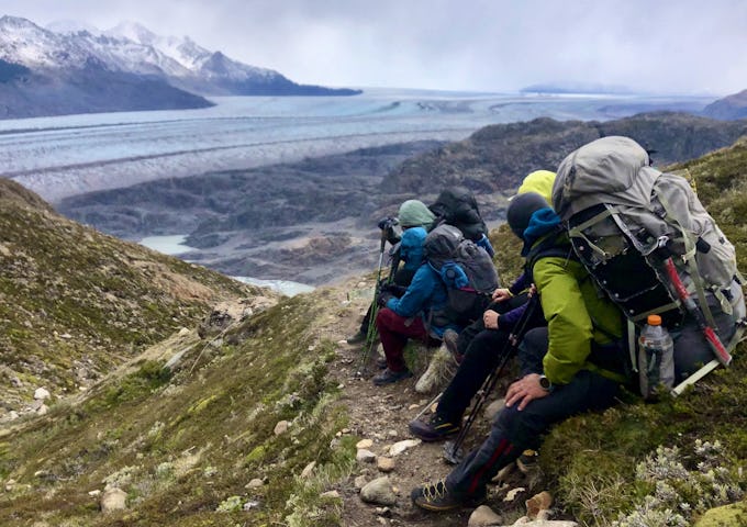 Hikers with rucksacks on the Huemul Circuit trek in Los Glaciares