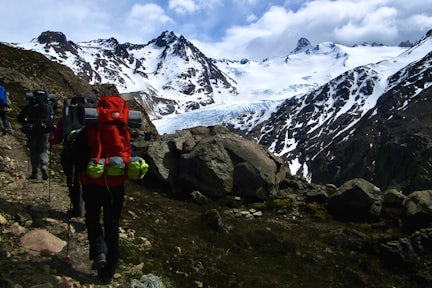 Hikers with rucksacks on the Huemul Circuit trek in Los Glaciares