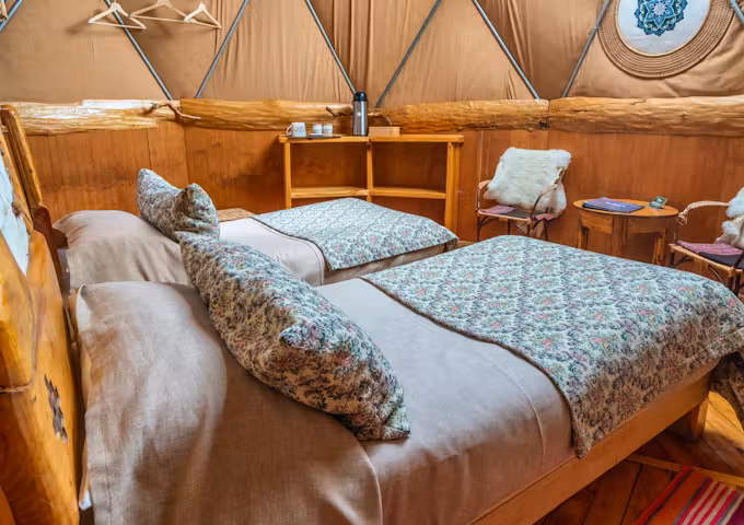 Interior of dome glamping tent at EcoCamp