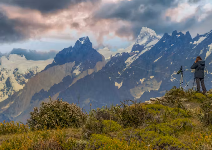 A wildlife guide scans the horizon for pumas in Torres del Paine