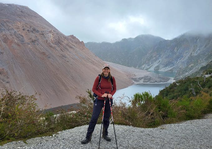 Hiker at the caldera of Chaitén Volcano in Pumalín Douglas Tomplins National Park, Chile