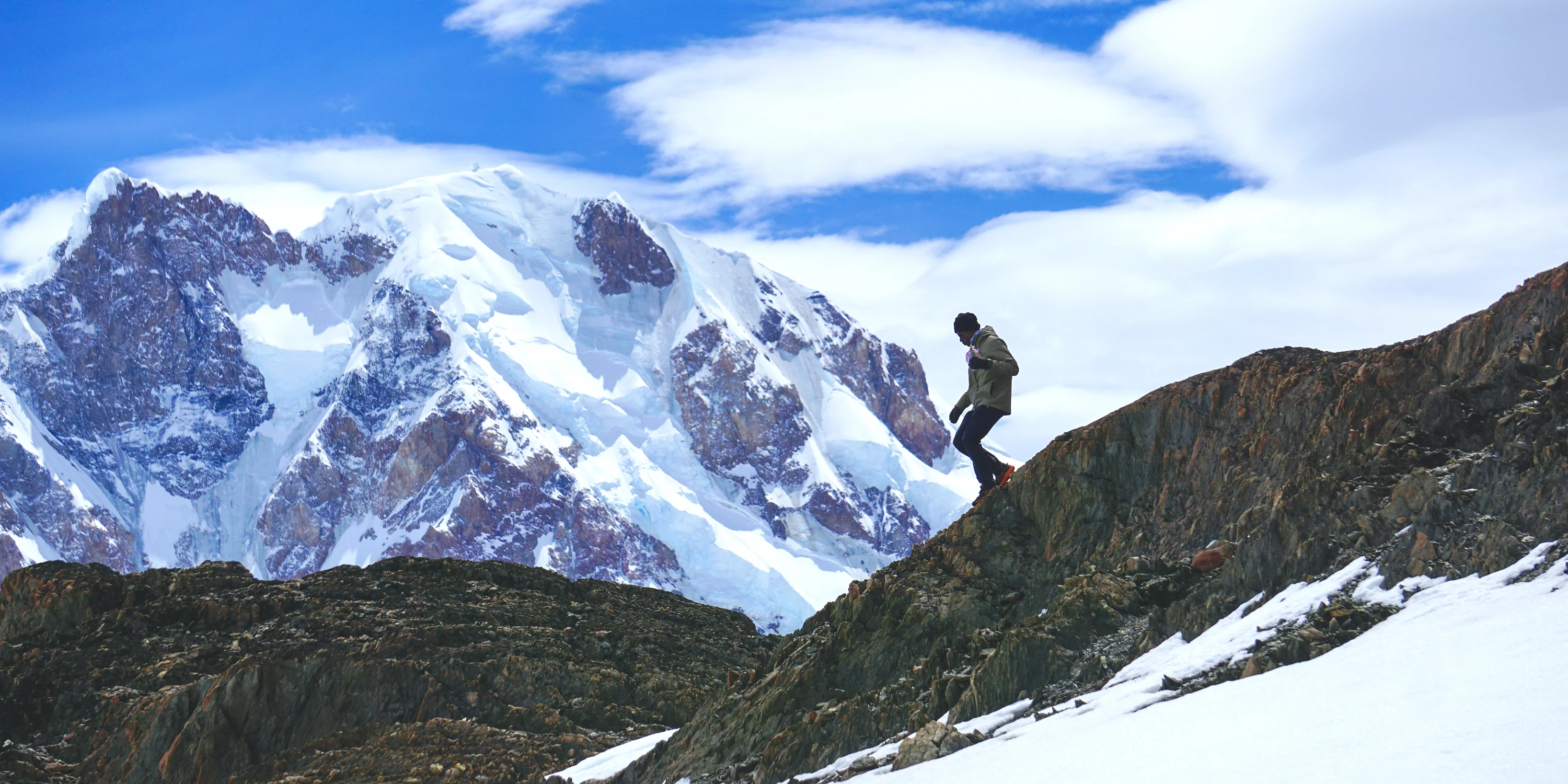 Hiker and mountains on day 2 of the Huemul Circuit trek in Los Glaciares