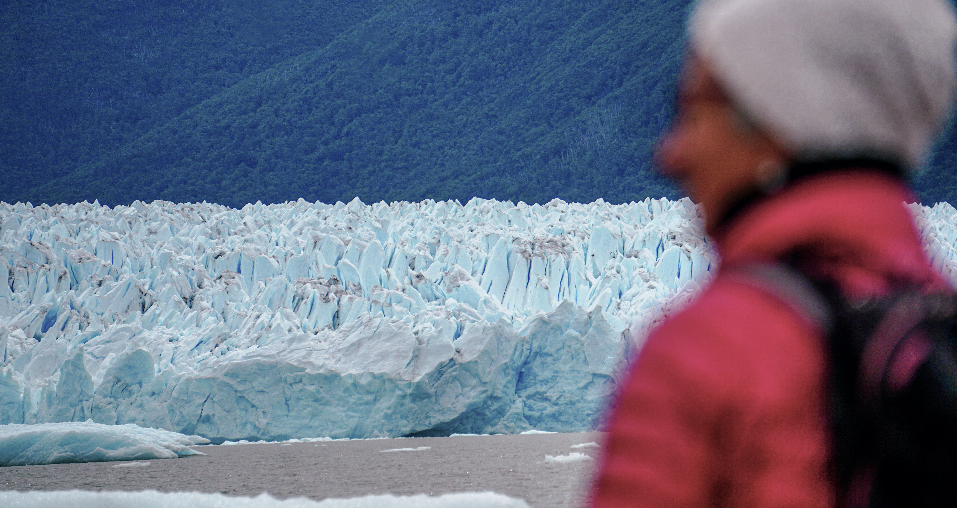 Tourist looking at Perito Moreno glacier